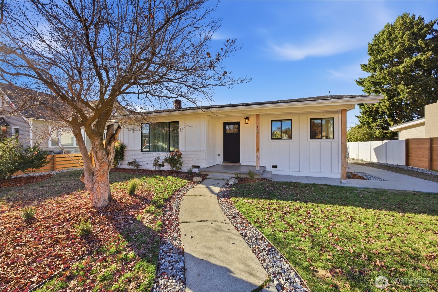 a view of a backyard with garden
