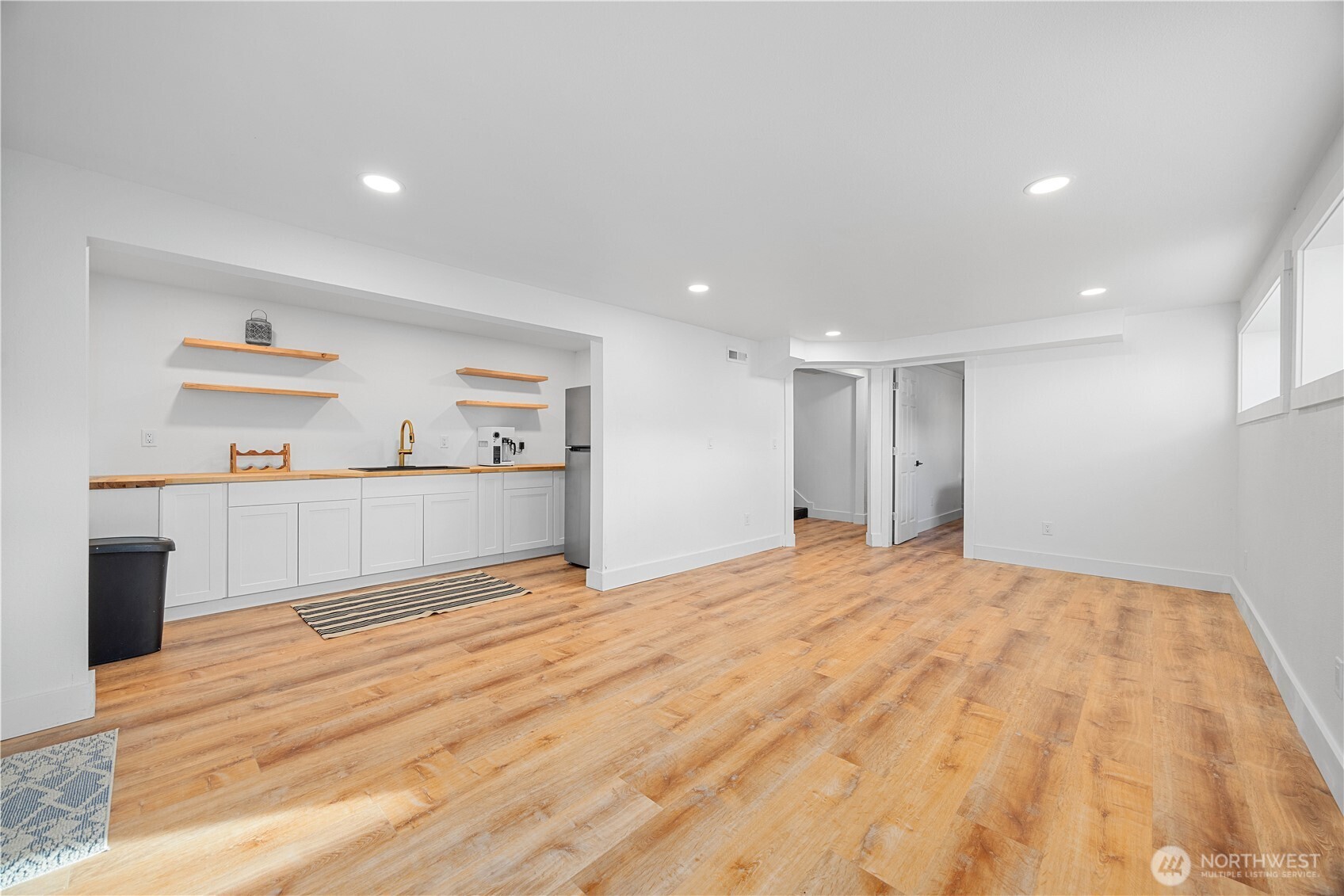 409 North Cedar Street Chelan, WA 98816 - Photo 20 of 33 a view of a room with wooden floor and cabinet