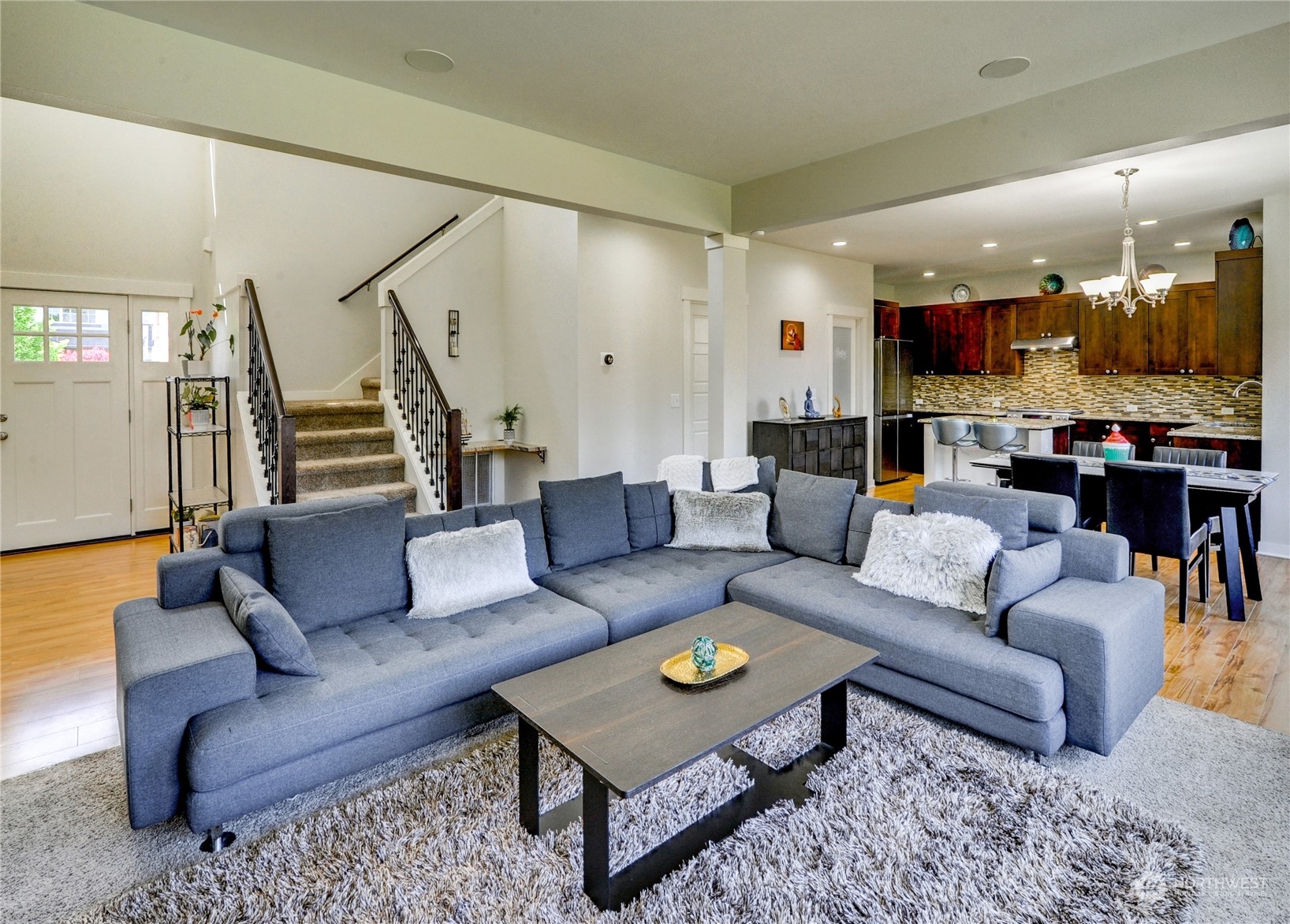829 218th Street Southeast Bothell, WA 98021 - Photo 17 of 40 a living room with furniture and kitchen view