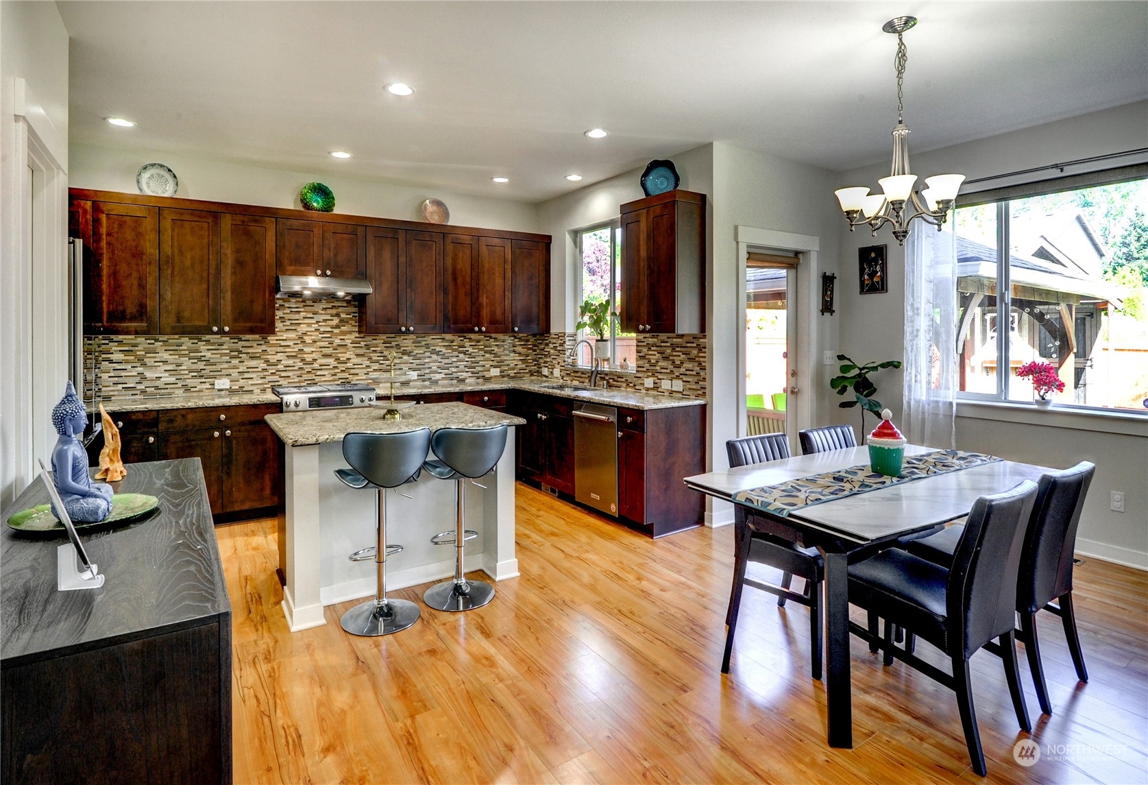 829 218th Street Southeast Bothell, WA 98021 - Photo 18 of 40 a kitchen with a table and chairs in it