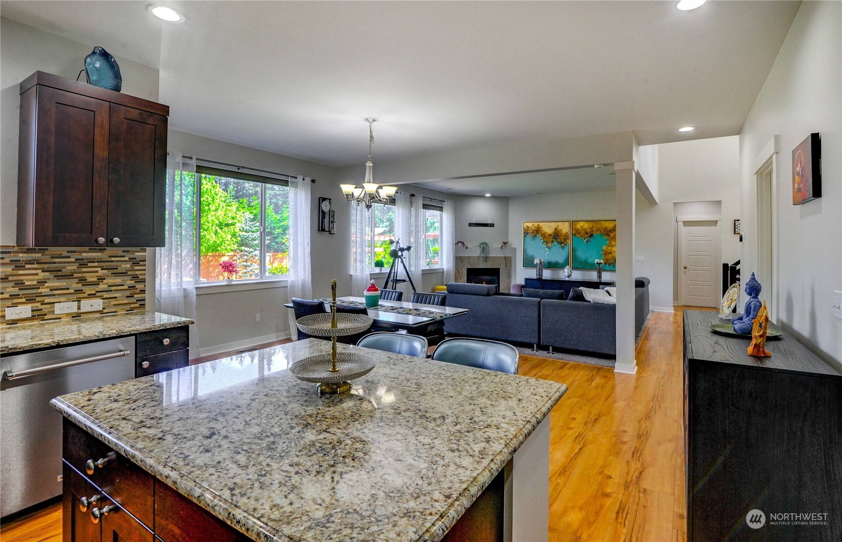 829 218th Street Southeast Bothell, WA 98021 - Photo 19 of 40 a kitchen with sink refrigerator and dining table