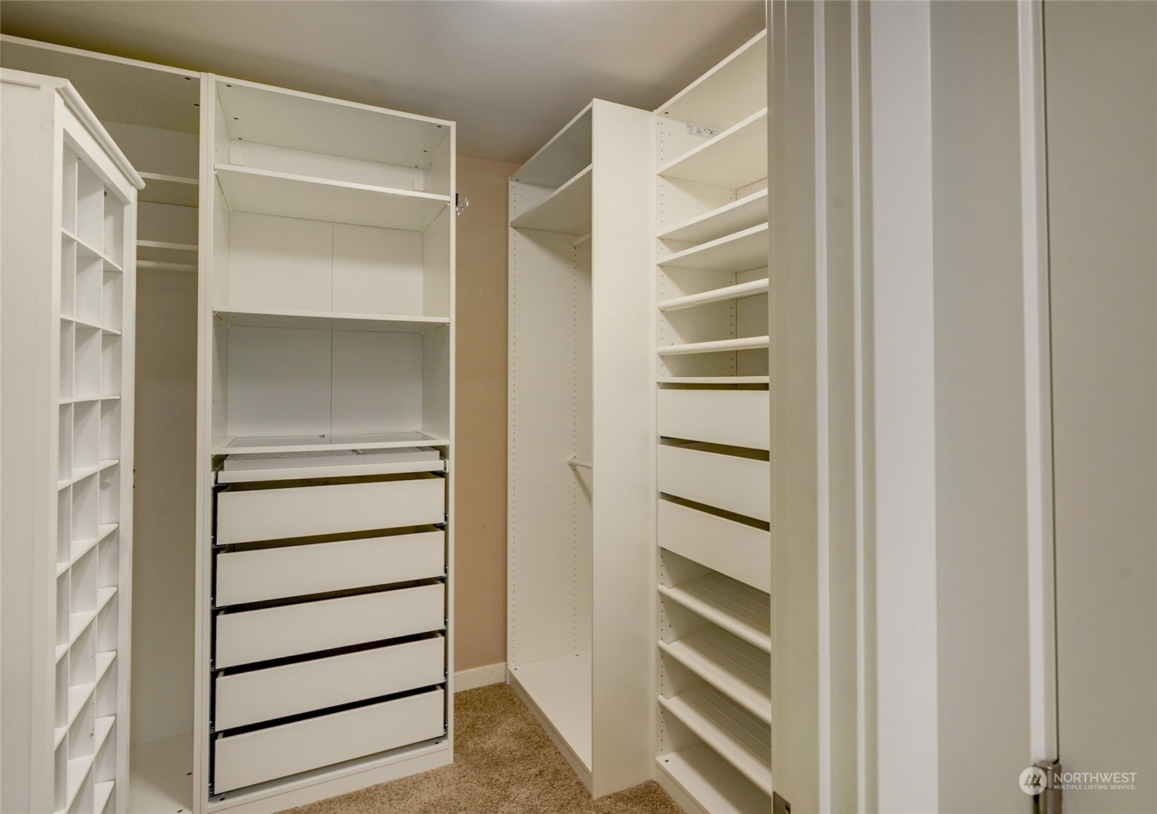829 218th Street Southeast Bothell, WA 98021 - Photo 28 of 40 a view of walk in closet with empty racks