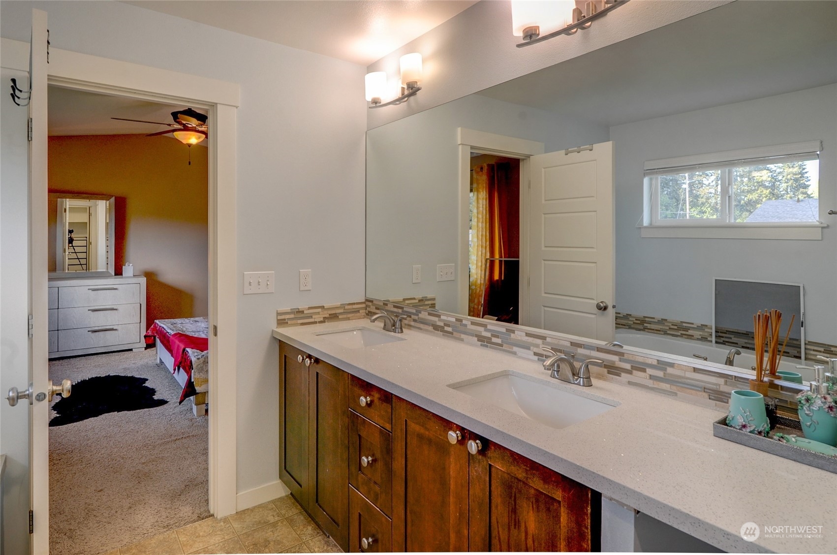 829 218th Street Southeast Bothell, WA 98021 - Photo 29 of 40 a bathroom with a sink double vanity and a mirror
