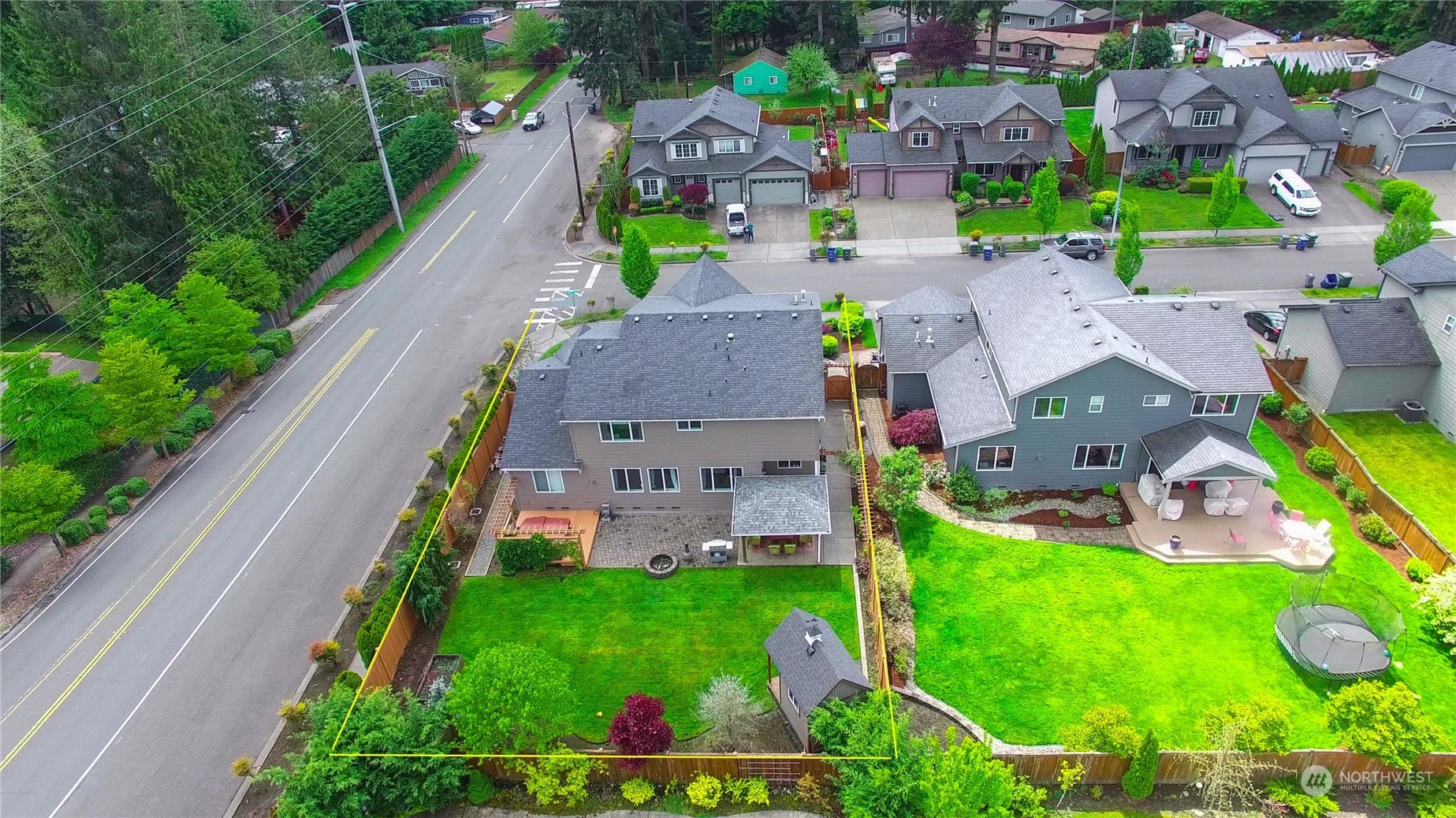 829 218th Street Southeast Bothell, WA 98021 - Photo 3 of 40 an aerial view of multiple houses with yard
