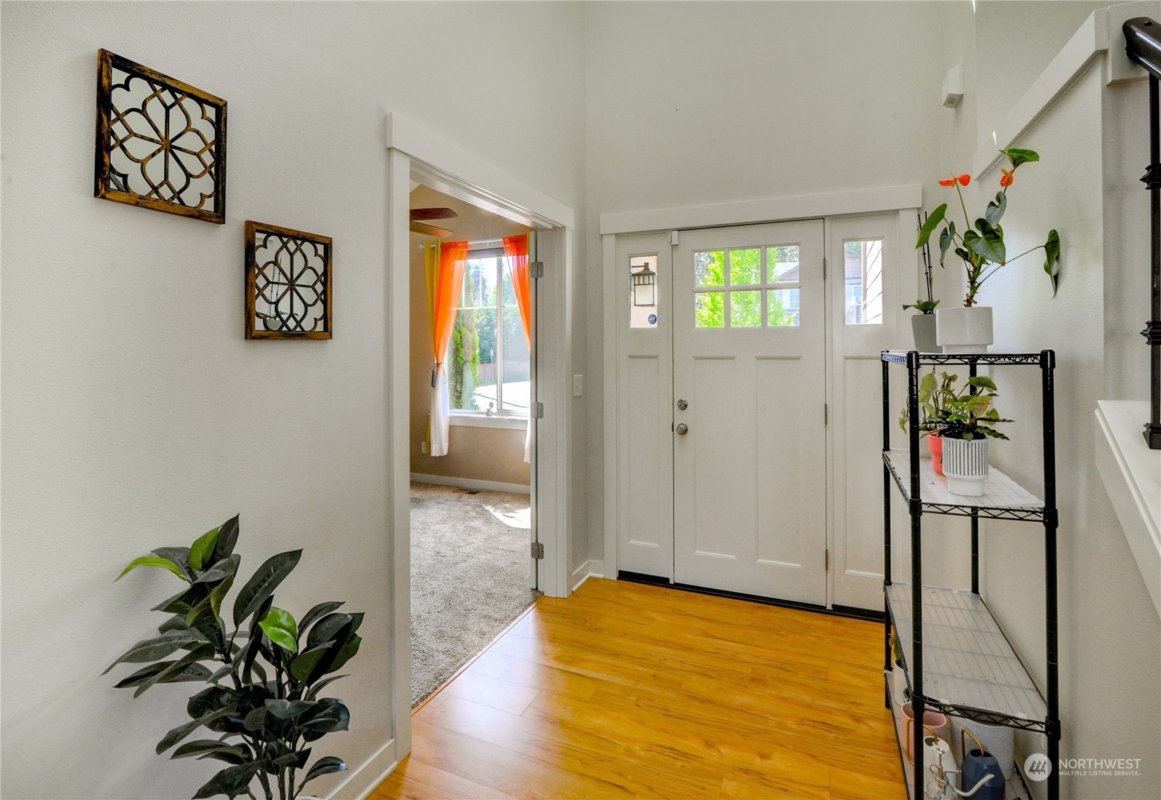 829 218th Street Southeast Bothell, WA 98021 - Photo 6 of 40 a view of an entryway with wooden floor
