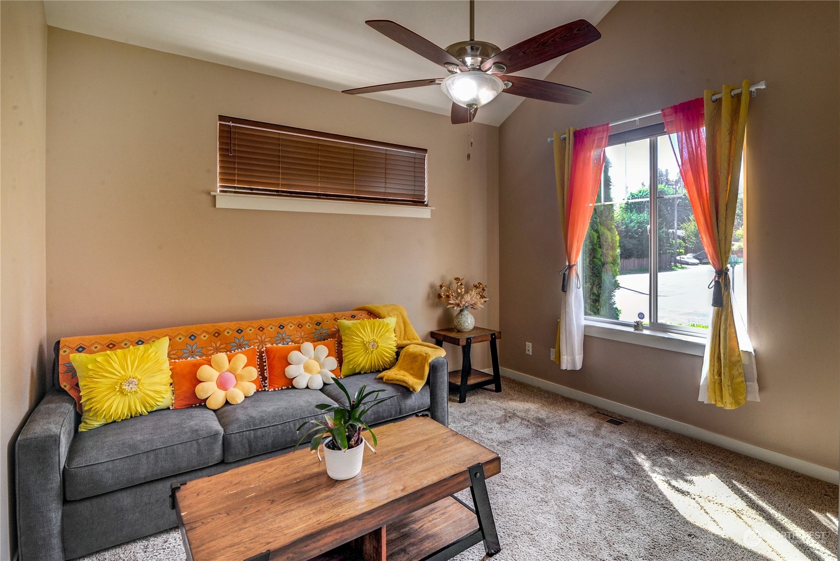 829 218th Street Southeast Bothell, WA 98021 - Photo 9 of 40 a living room with furniture and a window