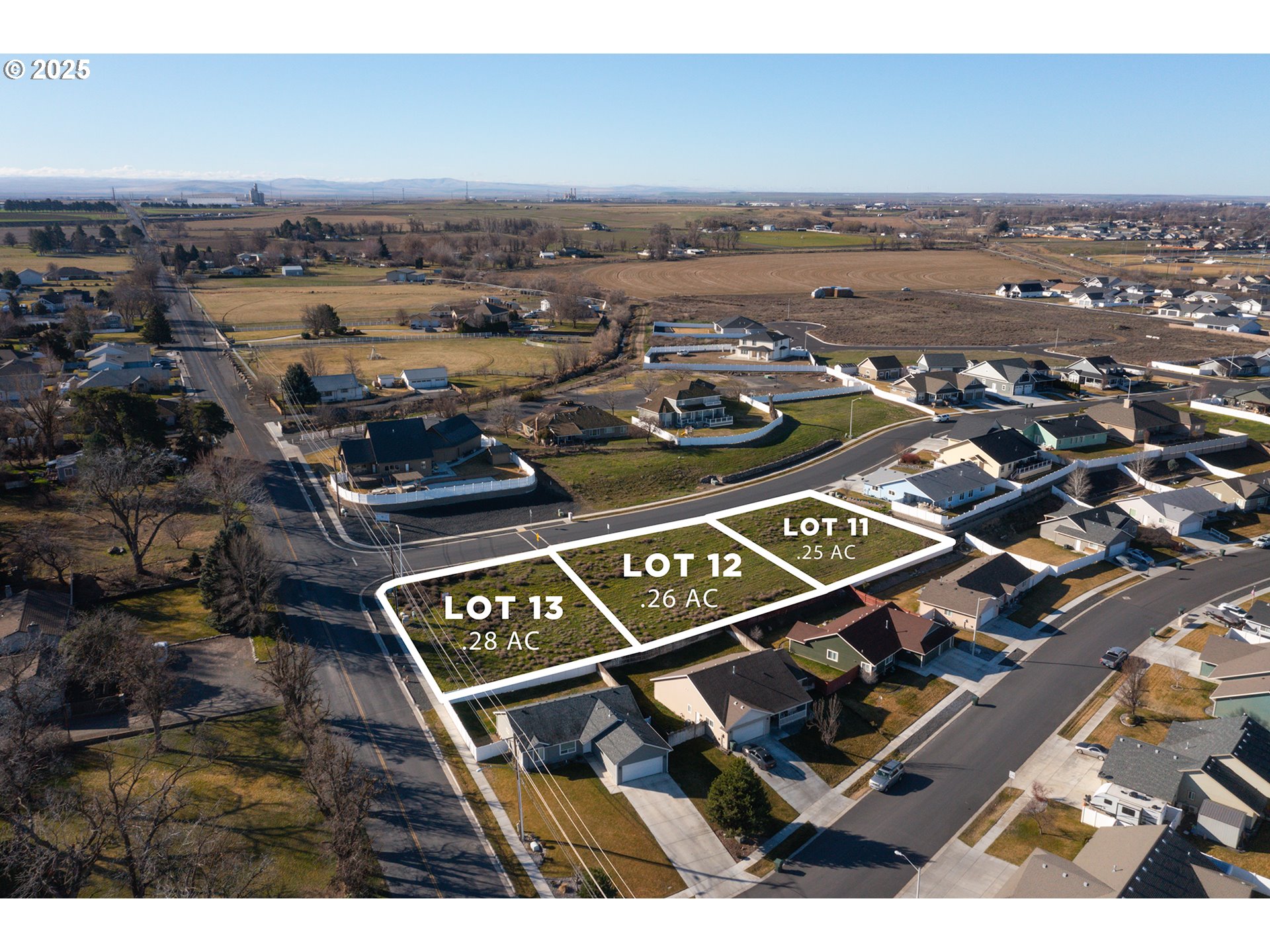 106 Southwest Desert Sky Drive, Unit 12 Hermiston, OR 97838 - Photo 4 of 6 an aerial view of a city