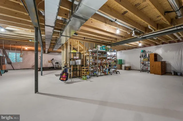 a view of parking garage with cars