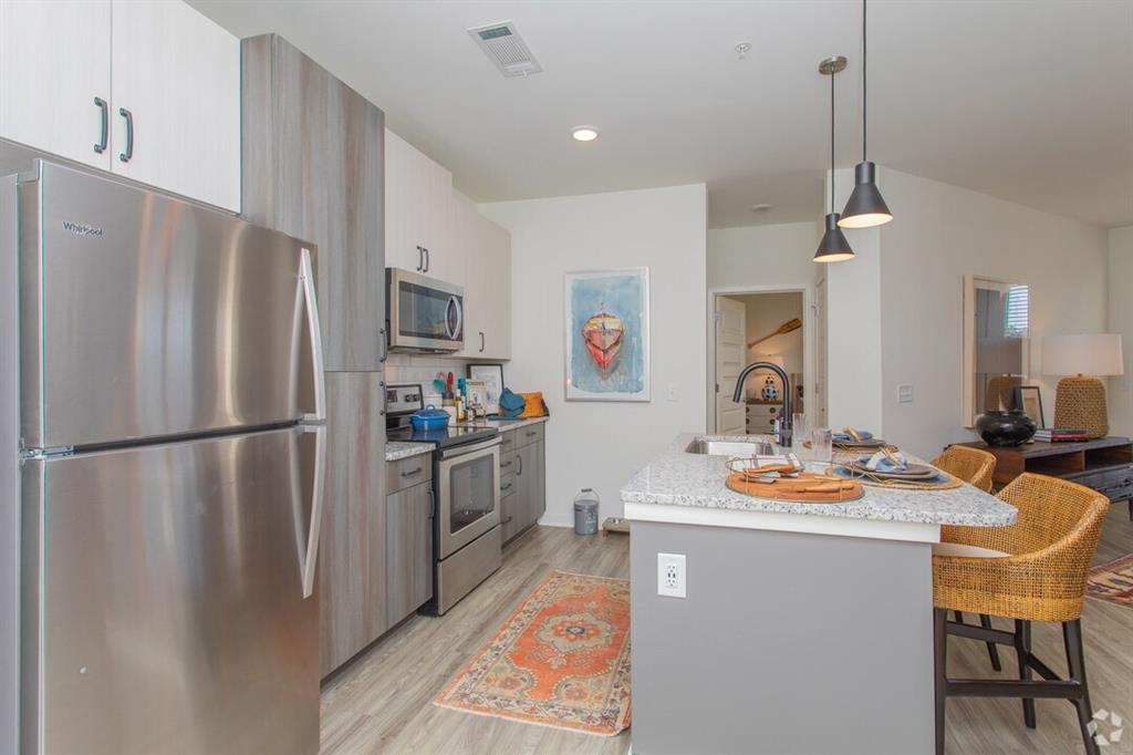 6255 Riverview Road Southeast, Unit A4 Smyrna, GA 30126 - Photo 13 of 17 a kitchen with refrigerator and cabinets