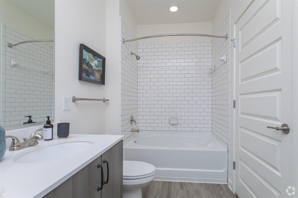 6255 Riverview Road Southeast, Unit A4 Smyrna, GA 30126 - Photo 15 of 17 a bathroom with a sink toilet and shower