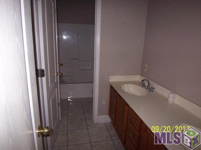 115 Magnolia Street Raceland, LA 70394 - Photo 9 of 10 Bathroom 1
