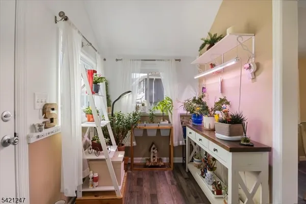 a kitchen with stainless steel appliances granite countertop a sink and cabinets