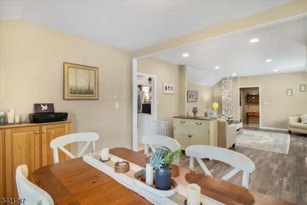 a kitchen with a sink appliances and cabinets