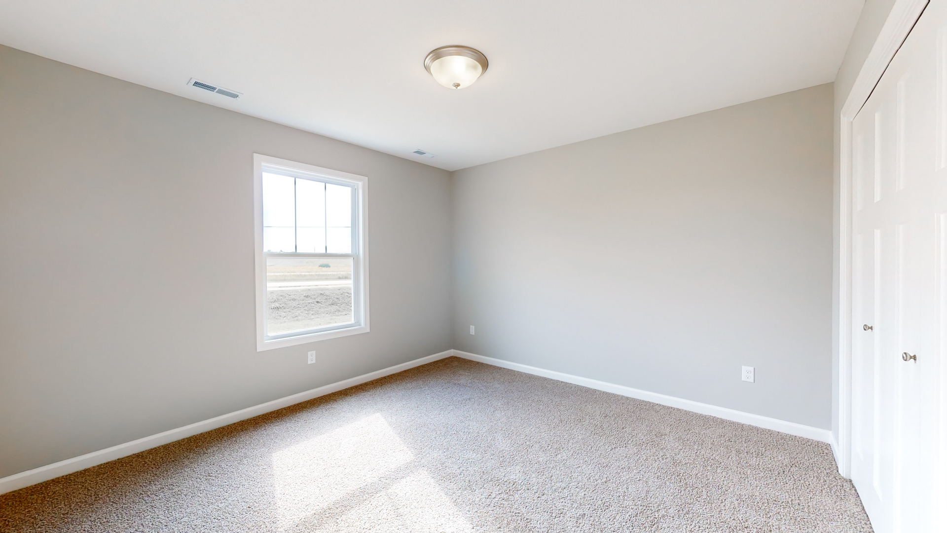 2 Megan Court Bloomington, IL 61705 - Photo 19 of 27 an empty room with a window