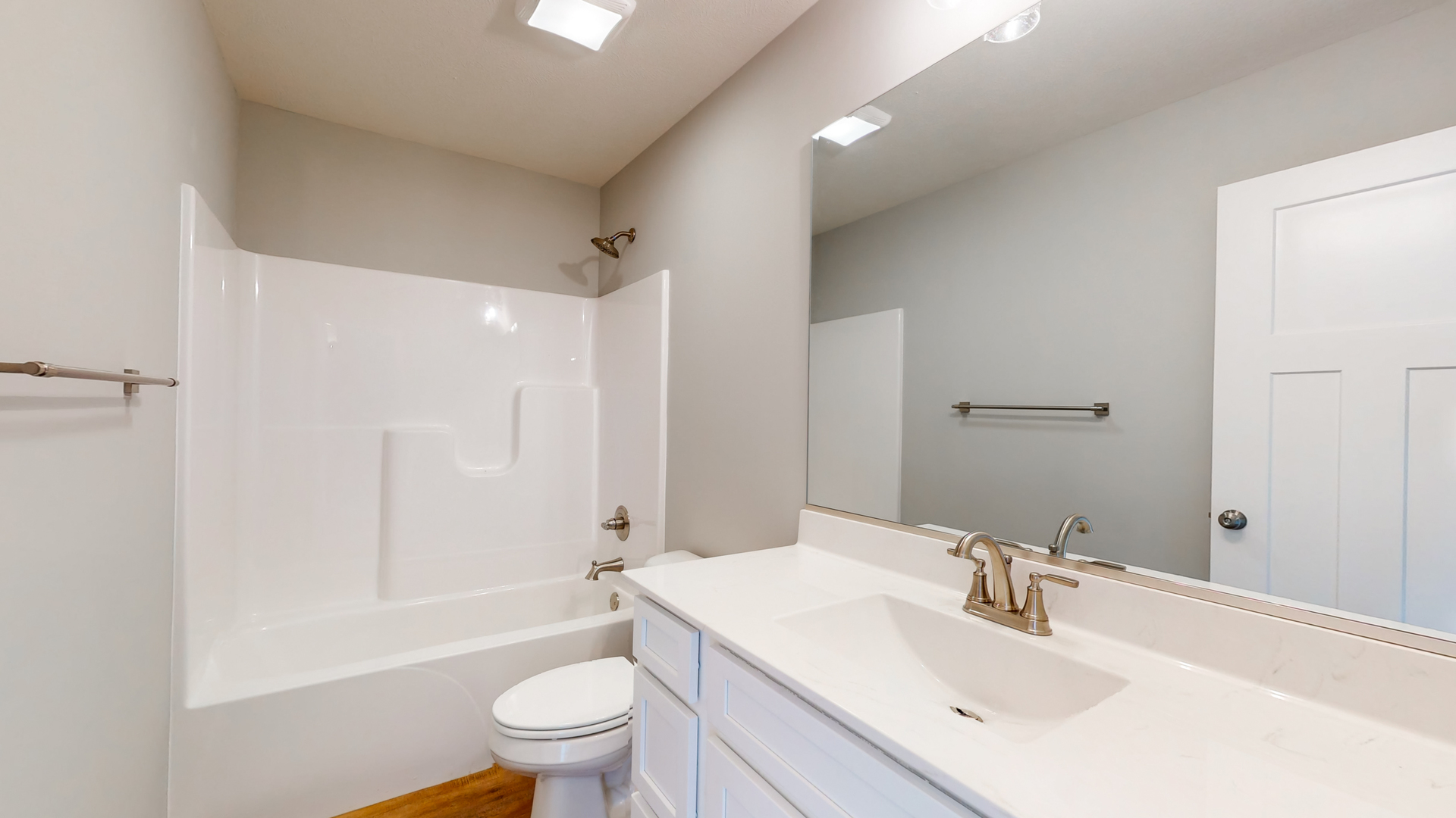 2 Megan Court Bloomington, IL 61705 - Photo 21 of 27 a bathroom with a sink a toilet and shower