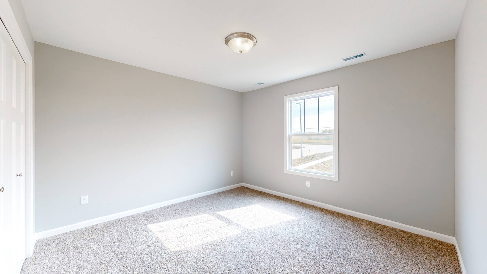 2 Megan Court Bloomington, IL 61705 - Photo 22 of 27 an empty room with a window