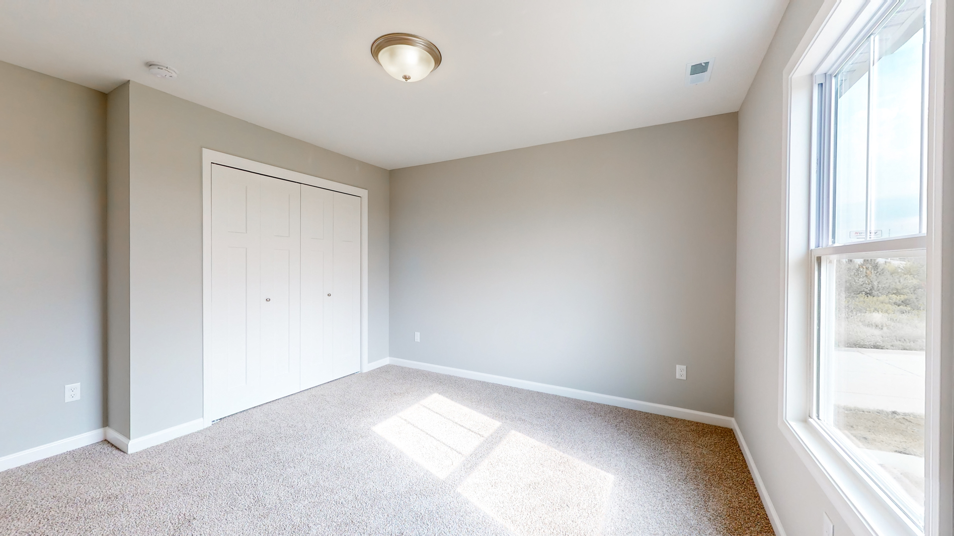 2 Megan Court Bloomington, IL 61705 - Photo 23 of 27 an empty room with windows