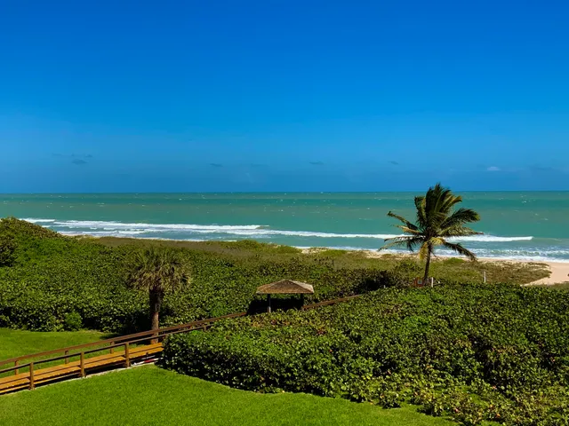 a view of a ocean with a yard