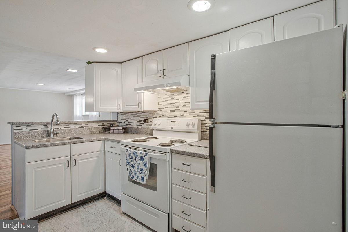 10700 Ward Road Dunkirk, MD 20754 - Photo 27 of 38 Full kitchen downstairs
