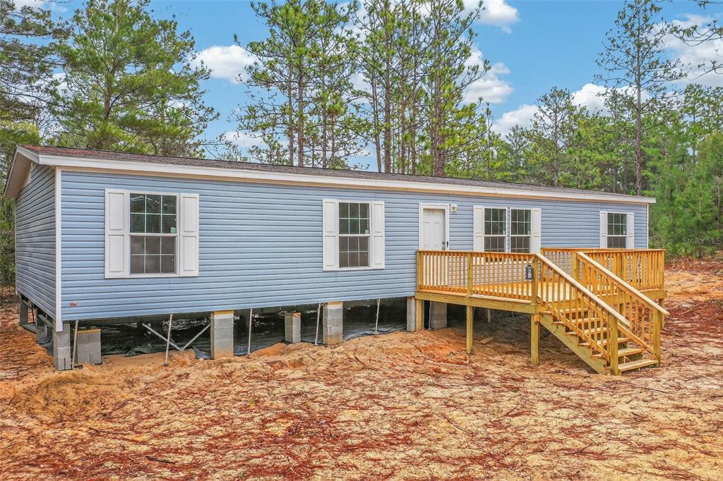 419 Lily Trail Interlachen, FL 32148 - Photo 41 of 82 a house view with a backyard space