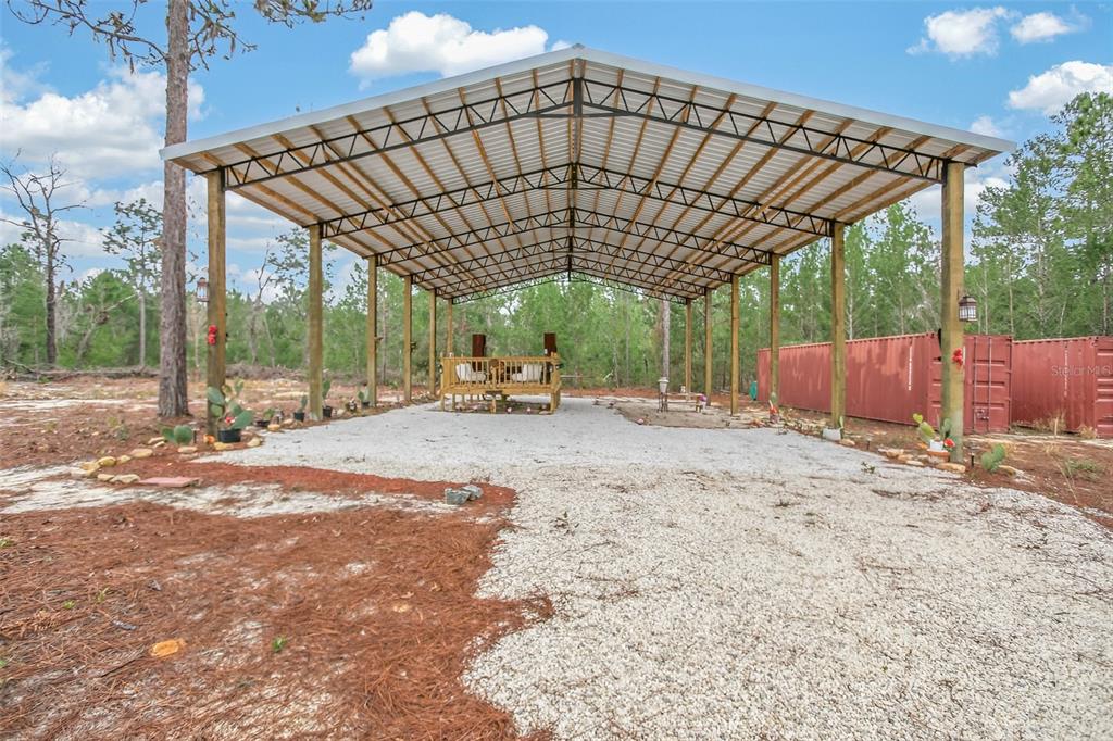 419 Lily Trail Interlachen, FL 32148 - Photo 43 of 82 a view of a wooden deck with a yard