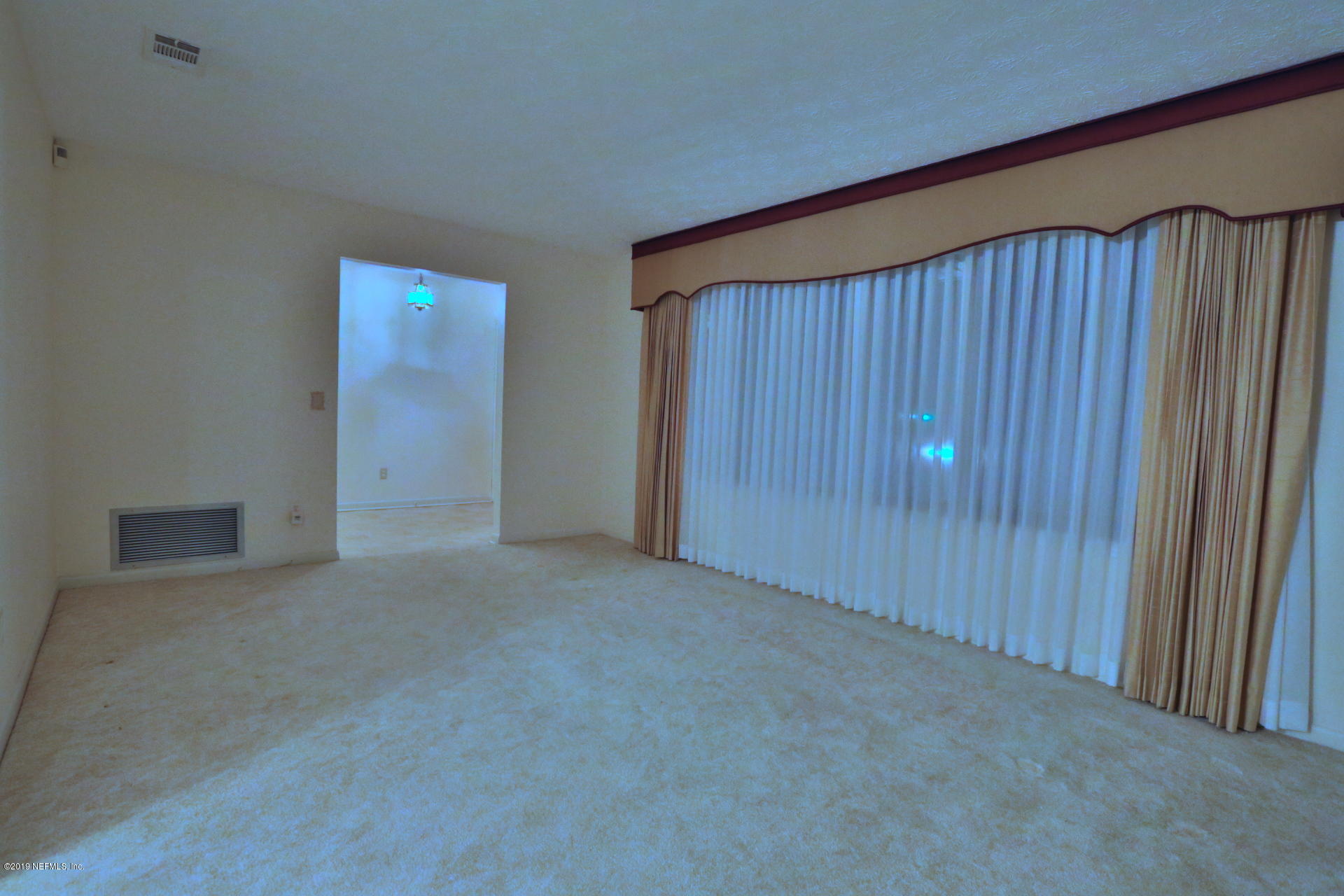7305 Floral Ridge Drive Jacksonville, FL 32277 - Photo 14 of 27 an empty room with closet area