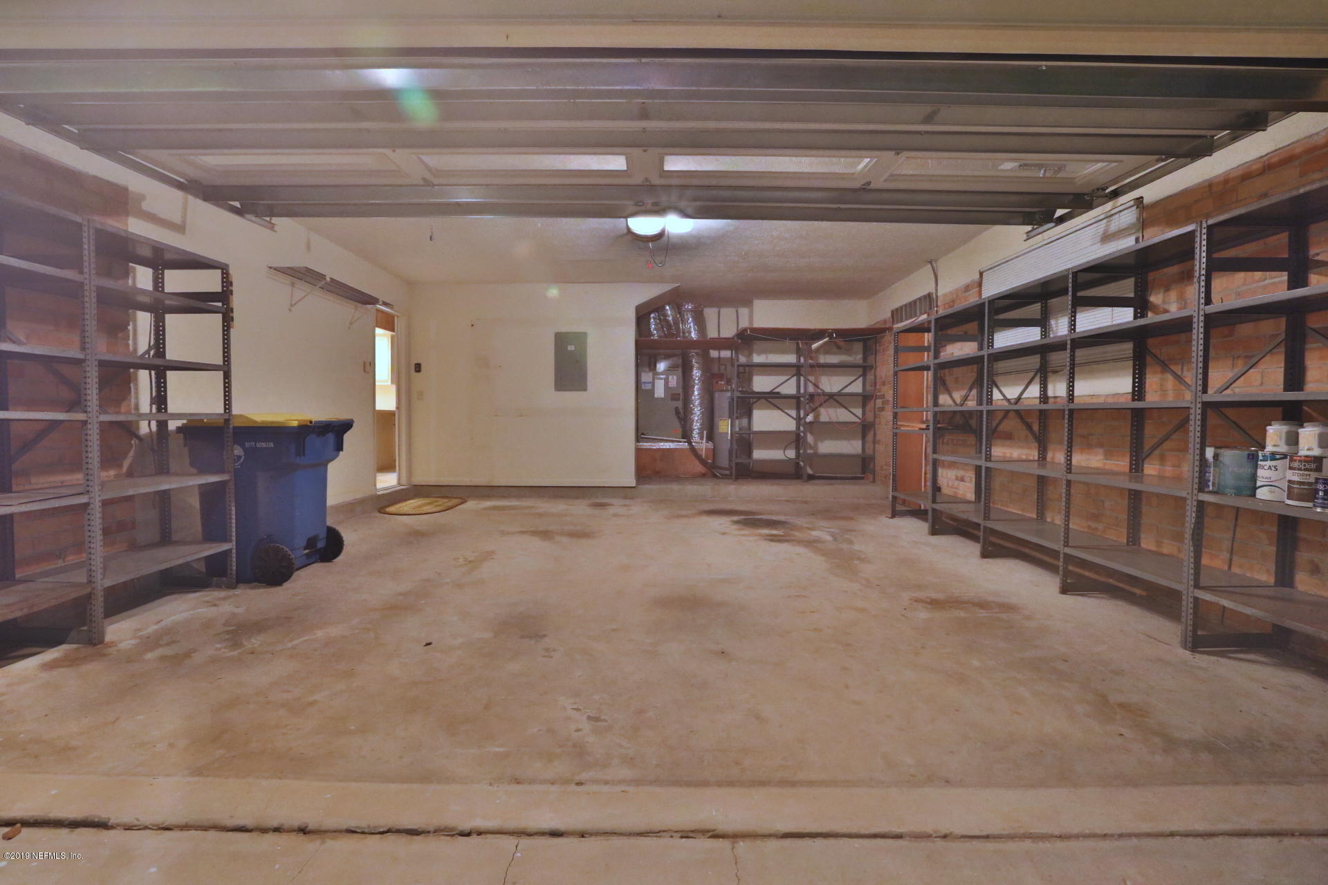 7305 Floral Ridge Drive Jacksonville, FL 32277 - Photo 27 of 27 a view of an empty room with bookshelf