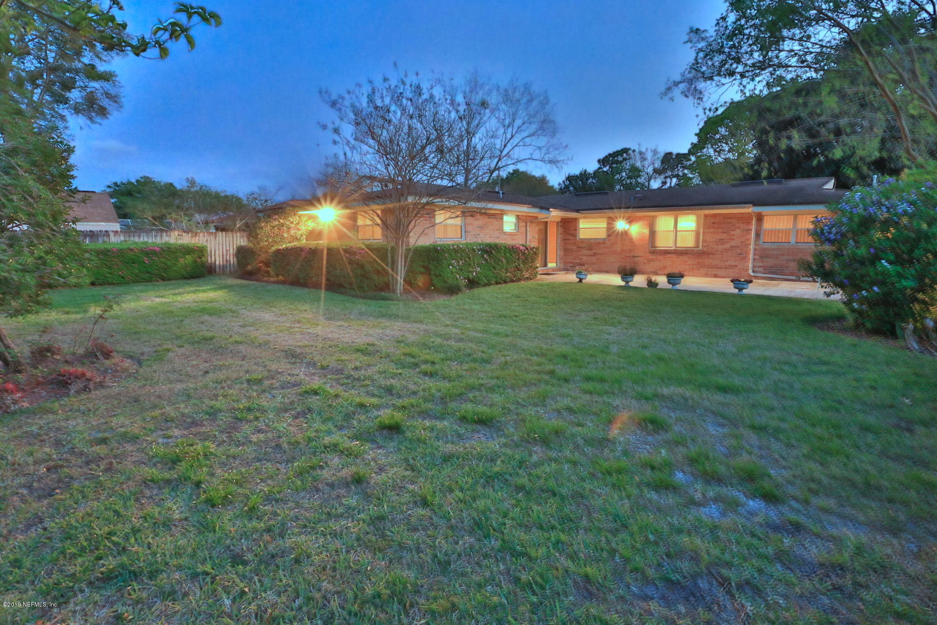 7305 Floral Ridge Drive Jacksonville, FL 32277 - Photo 9 of 27 a view of a backyard