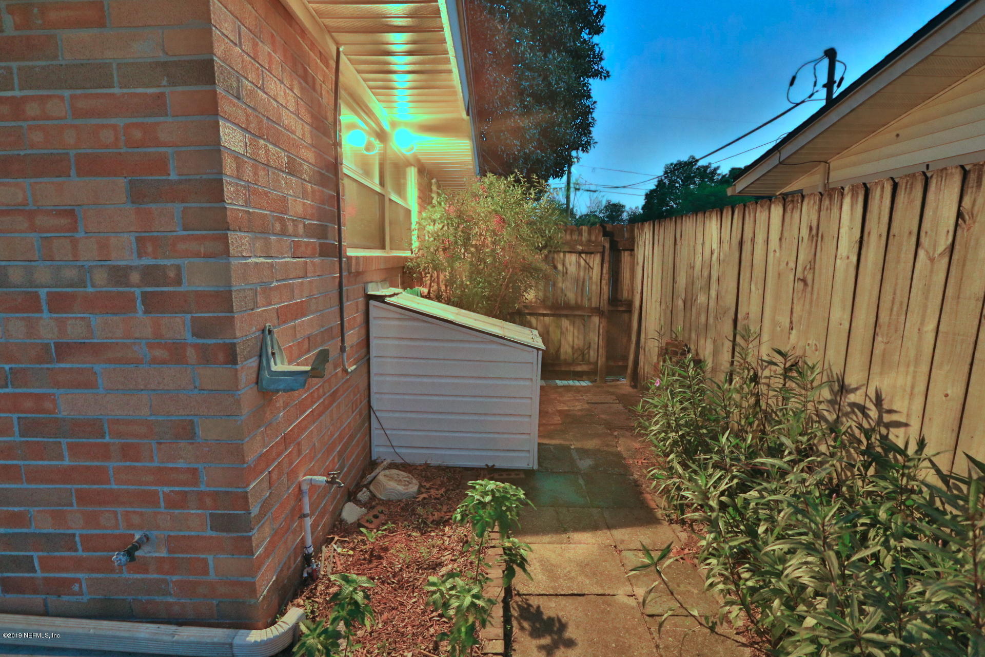 7305 Floral Ridge Drive Jacksonville, FL 32277 - Photo 10 of 27 a view of a pathway of a building
