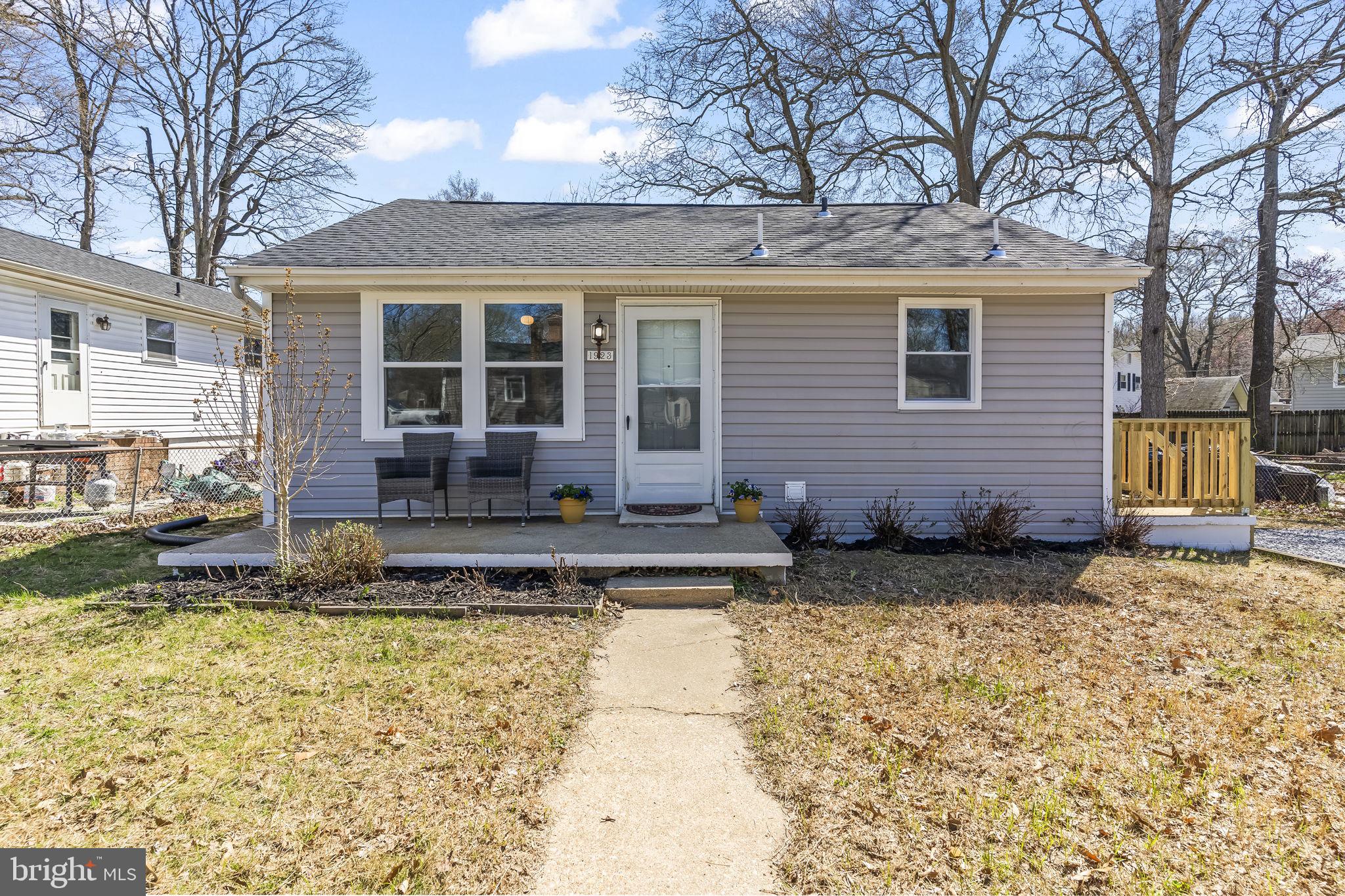 1923 Ridgeville Road Edgewater, MD 21037 - Photo 15 of 15 a front view of a house with a yard