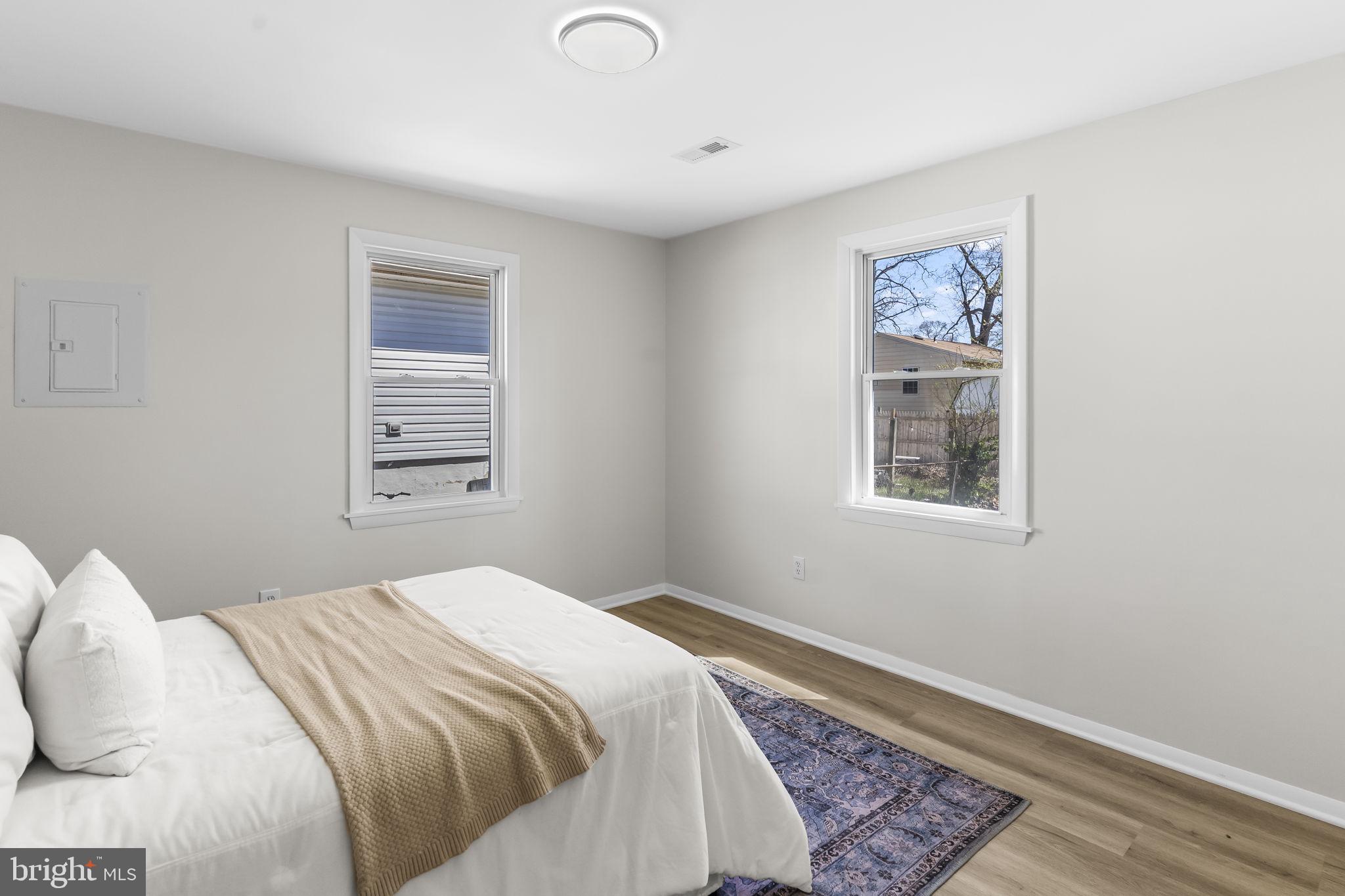 1923 Ridgeville Road Edgewater, MD 21037 - Photo 10 of 15 a bedroom with a bed and a window