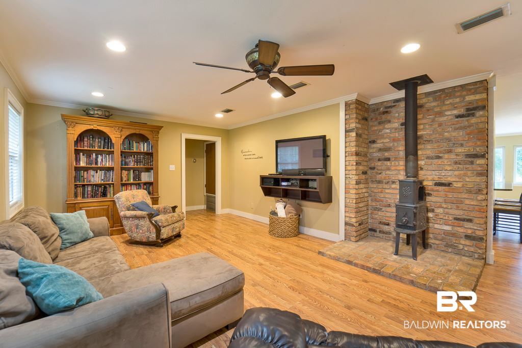 15710 Old Pierce Road Fairhope, AL 36532 - Photo 2 of 38 Features a Wood Burning Stove