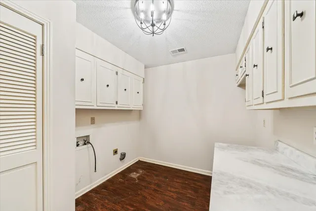 a view of kitchen with wooden floor