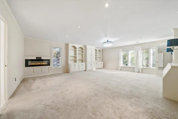 a view of an empty room with a stove
