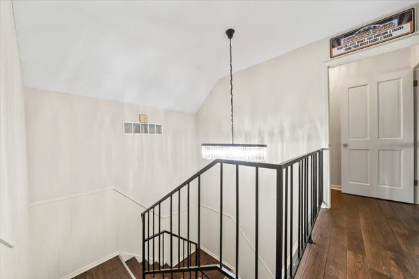 a view of entryway with wooden wall