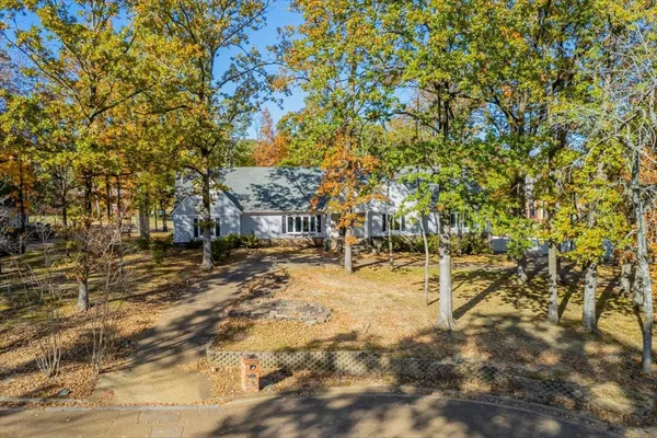 a view of yard with swimming pool