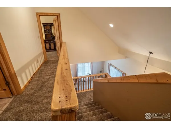 a view of a living room with a wooden floor