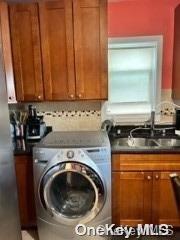 164-54 Nadal Place Queens, NY 11433 - Photo 5 of 9 a utility room with dryer and washer