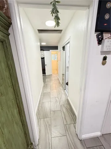 a bedroom with a bed and a fireplace