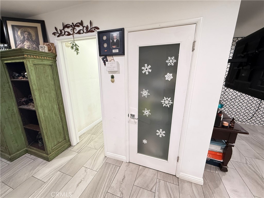 5836 Old Ranch Road Riverside, CA 92504 - Photo 41 of 59 a view of a utility room with closet and mirror