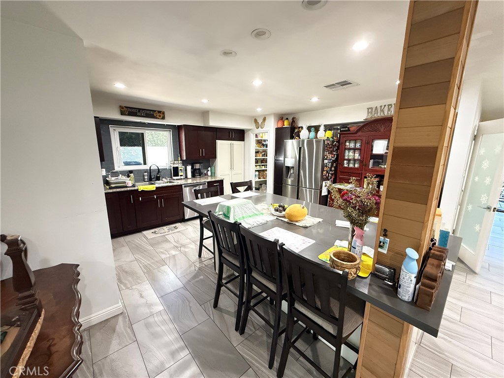 5836 Old Ranch Road Riverside, CA 92504 - Photo 45 of 59 a view of a dining room with furniture