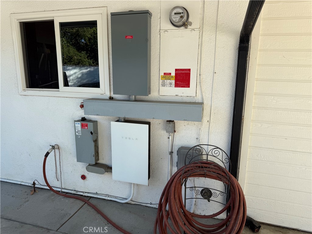 5836 Old Ranch Road Riverside, CA 92504 - Photo 47 of 59 a view of bathroom with washing machine and mirror