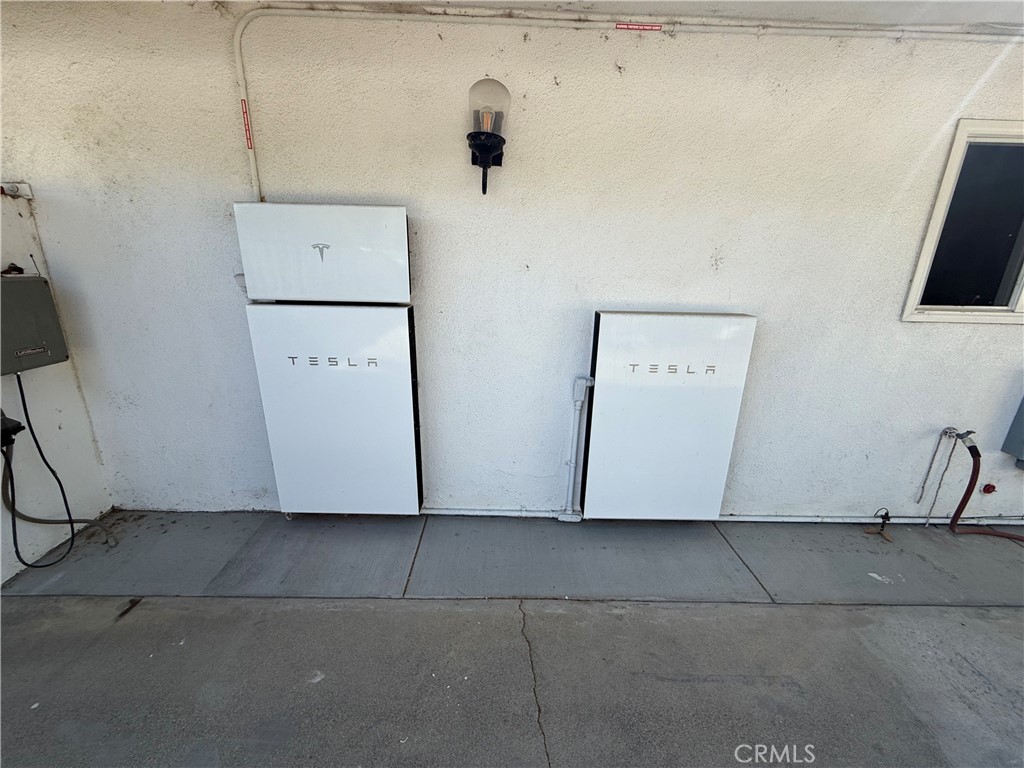 5836 Old Ranch Road Riverside, CA 92504 - Photo 48 of 59 a utility room with closet and mirror