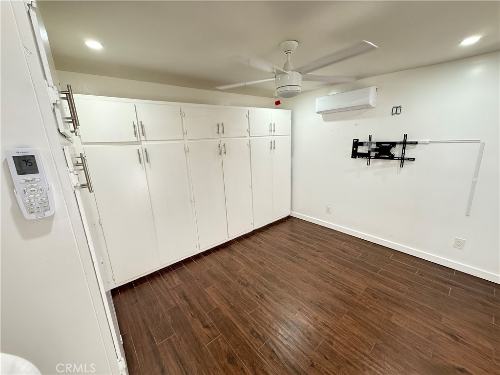 5836 Old Ranch Road Riverside, CA 92504 - Photo 53 of 59 a view of a refrigerator in wooden floor