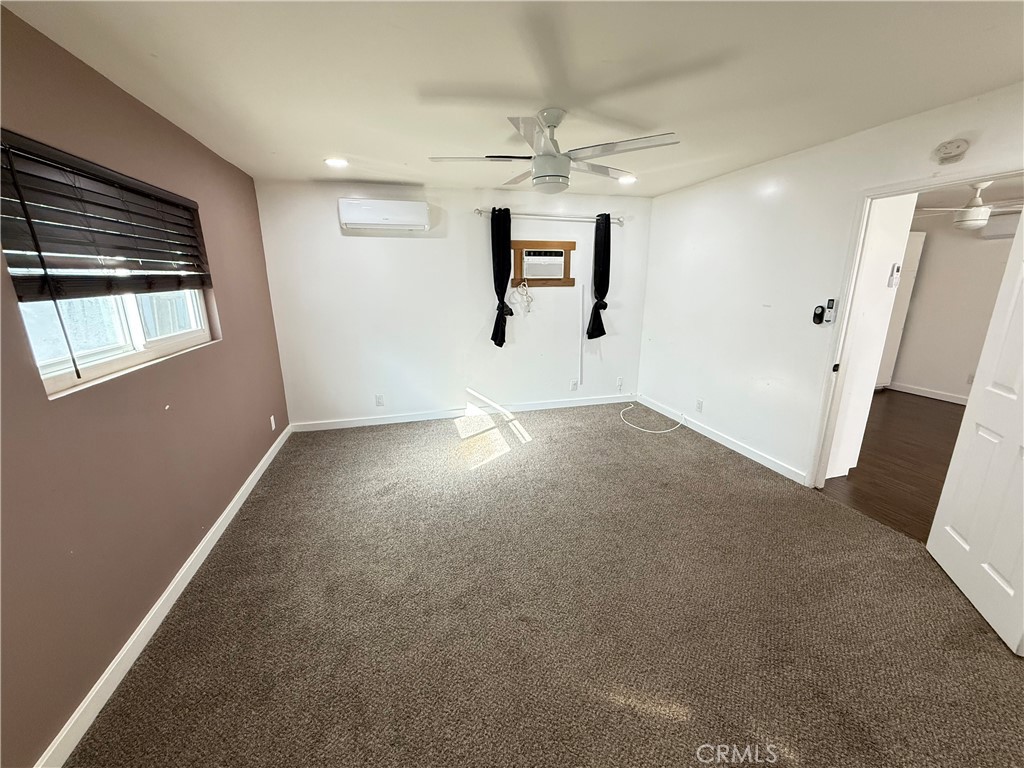 5836 Old Ranch Road Riverside, CA 92504 - Photo 55 of 59 an empty room with windows and entrance