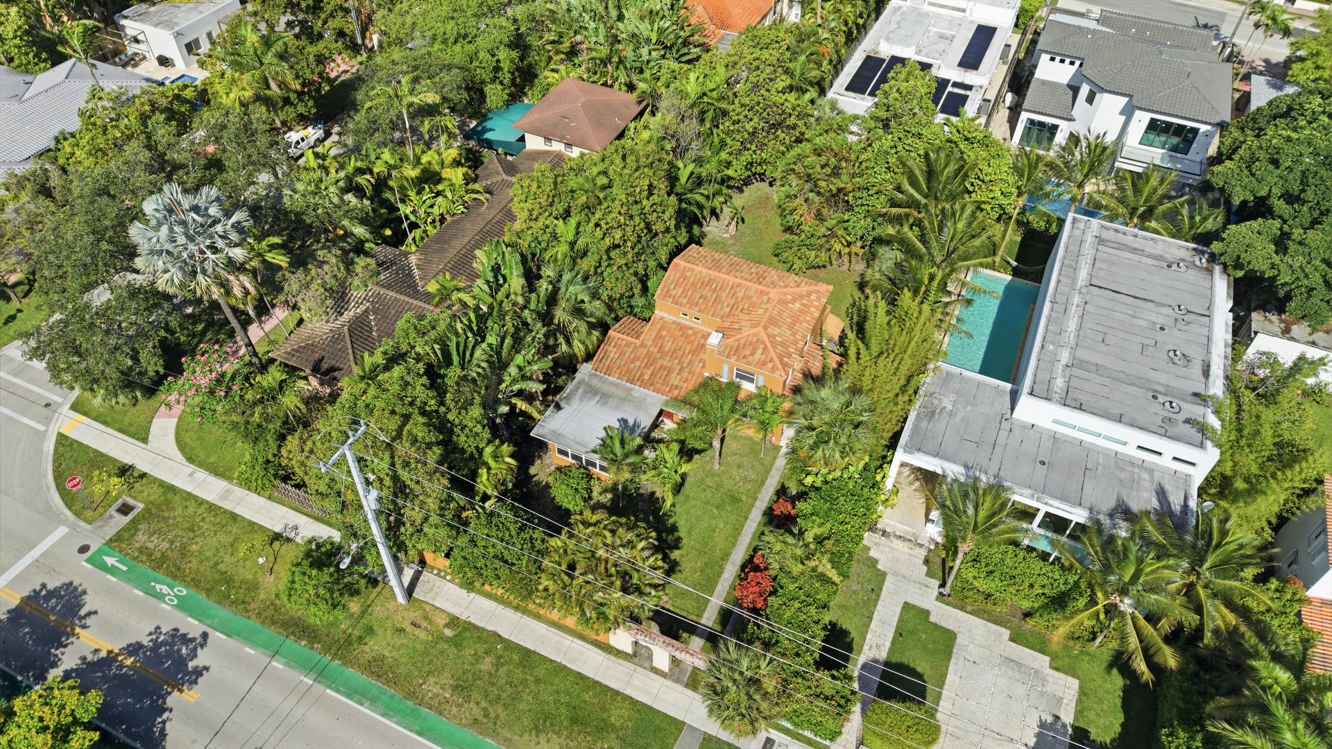 3716 Prairie Avenue Miami Beach, FL 33140 - Photo 5 of 20 an aerial view of a house with a yard and garden