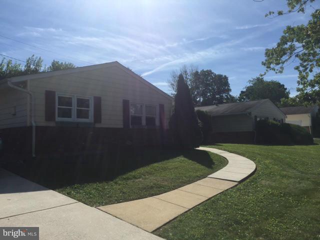 2013 Kennicott Road Baltimore, MD 21244 - Photo 11 of 12 a view of a house with a yard