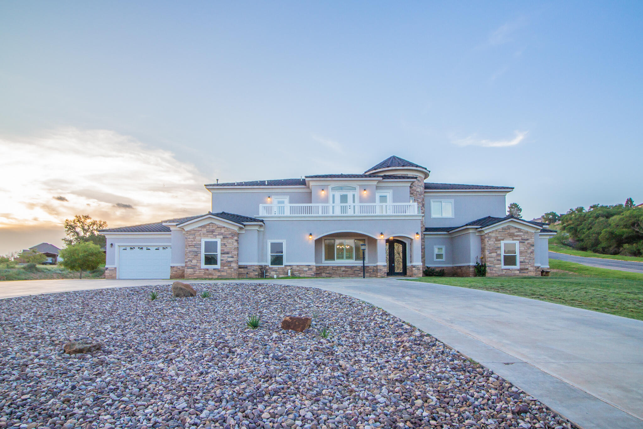 front view of a house with a yard