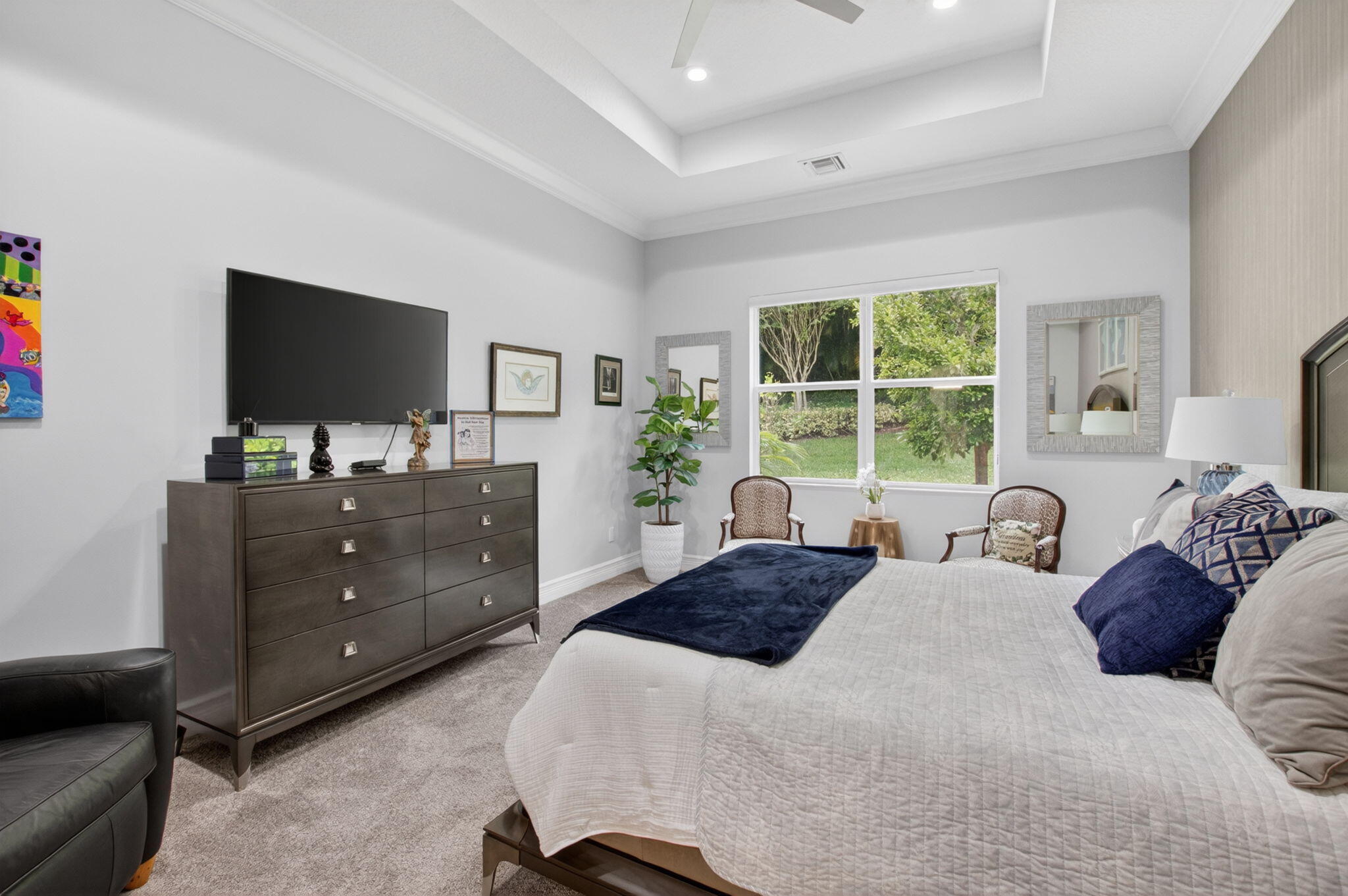 8263 Arabian Range Road Boynton Beach, FL 33473 - Photo 31 of 52 a bedroom with a bed and a flat screen television
