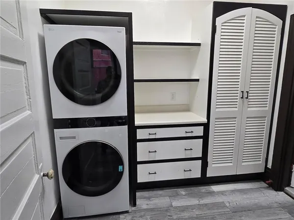 a utility room with dryer and washer